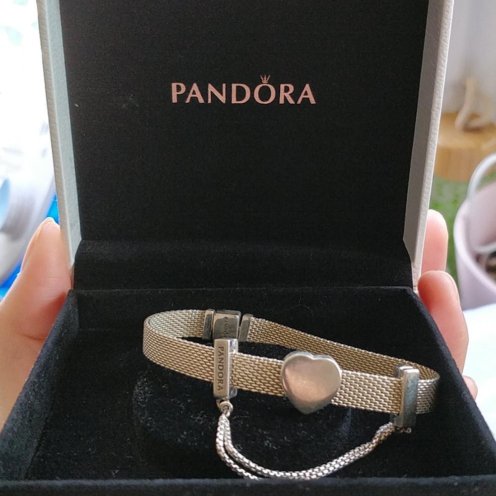 Pandora bracelet with 2 clip charms